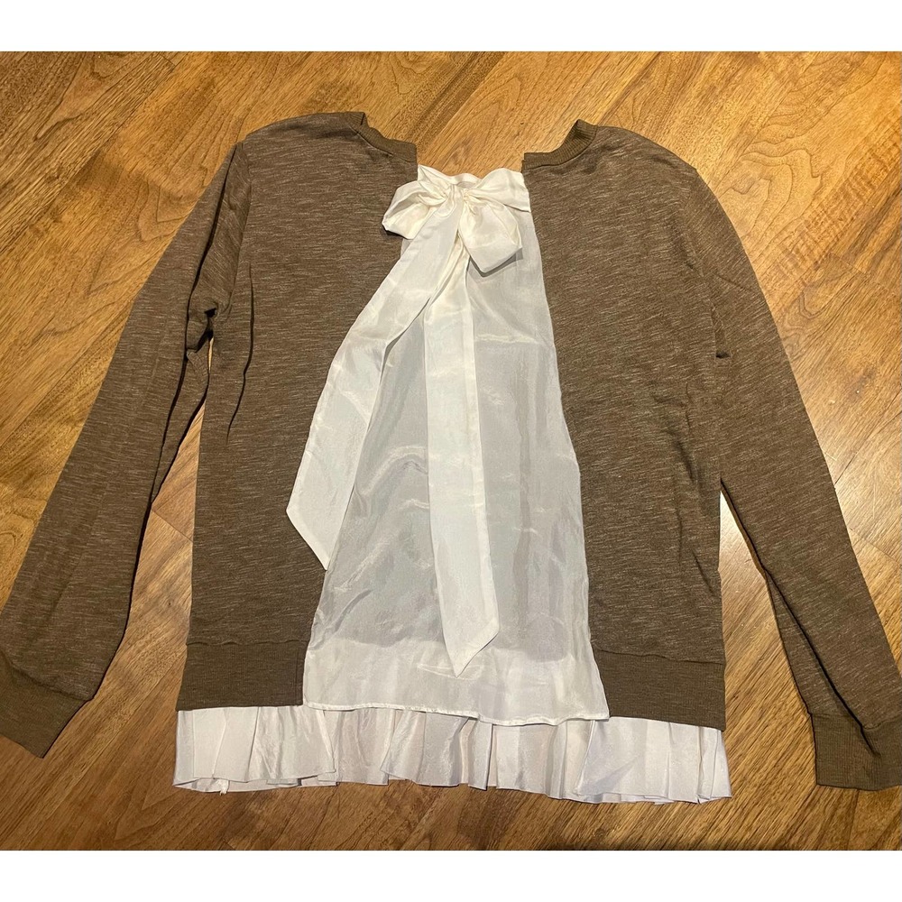Clu sweater with back fabric and tie, ruffle hem